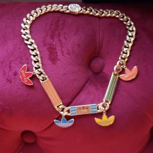 Gucci X Adidas Treefoil necklace/choker. RARE FIND! REVERSIBLE GOLD